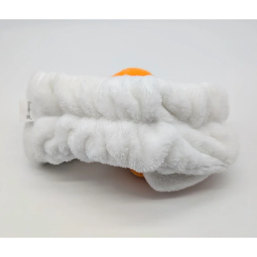 the CREME Hello Kitty Halloween Plush Spa Headband with Candy Corn Bow Limited